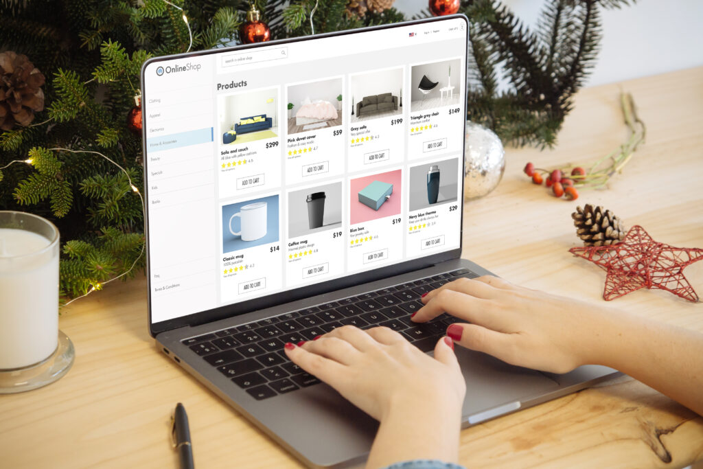 christmas sale laptop with hands typing